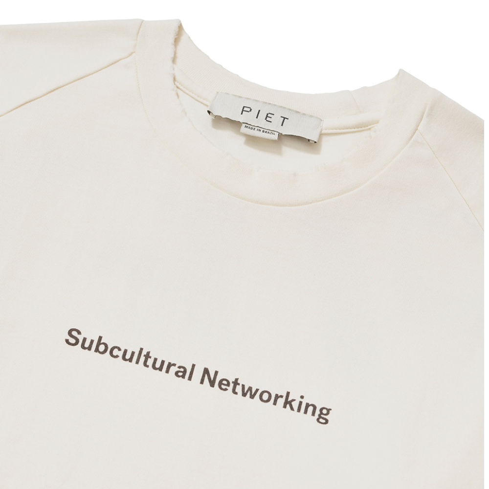 Camiseta Raglan Piet Sub-cultural Networking Branca