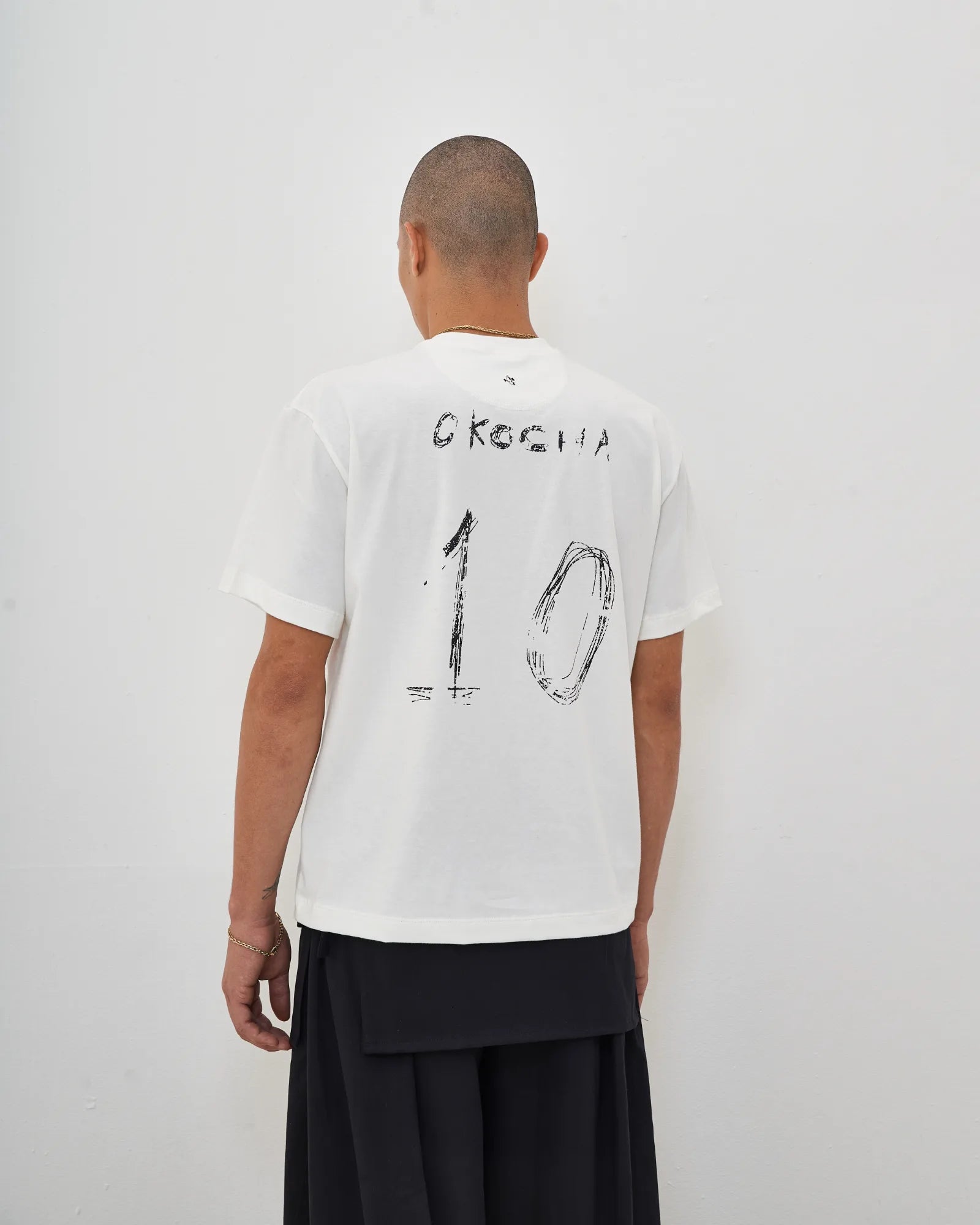 Camiseta Yucari Okocha Branca