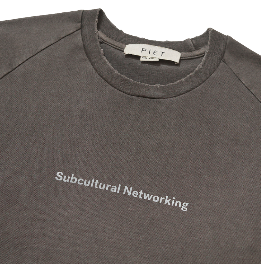 Camiseta Raglan Piet Sub-cultural Networking Preta